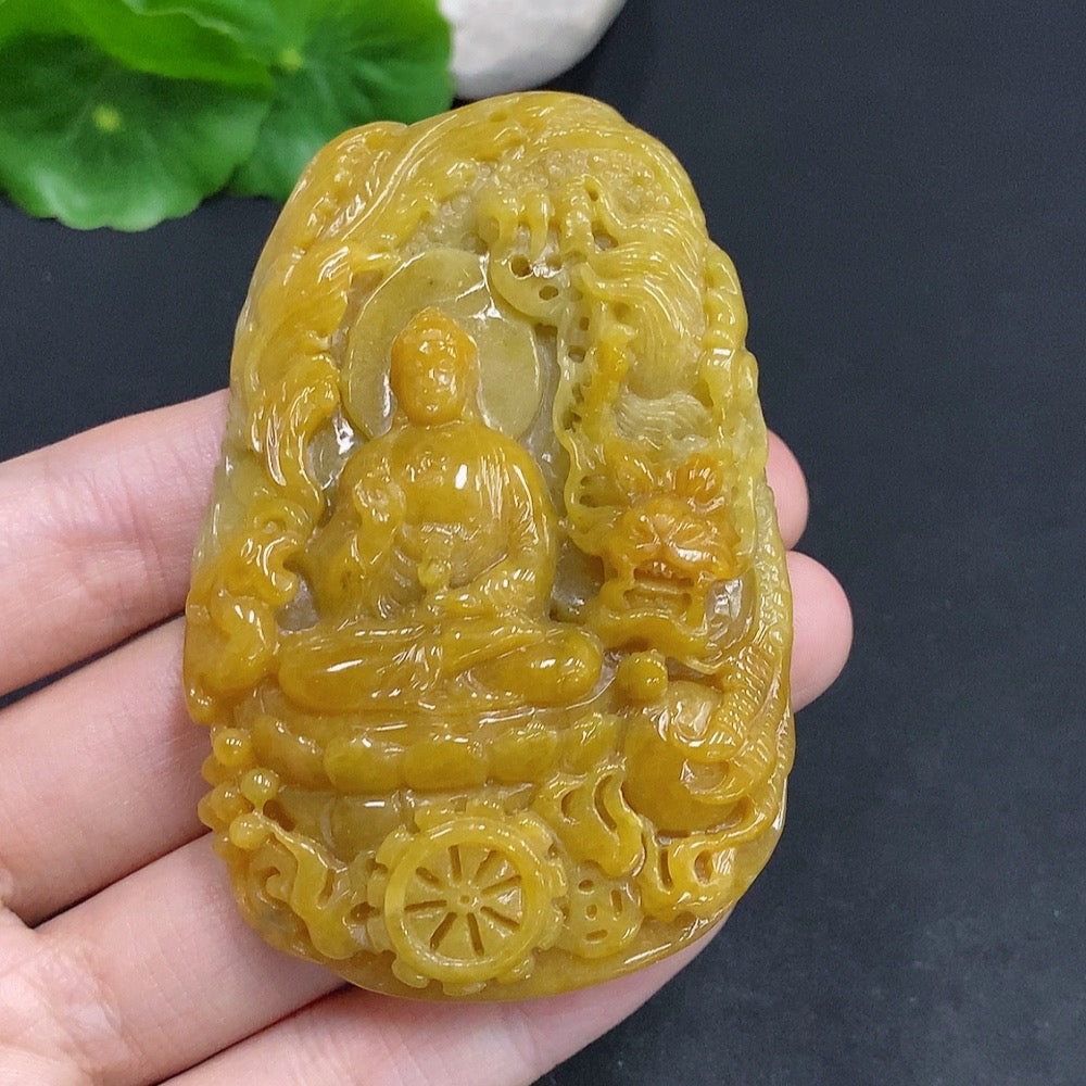 Jadeite Amitabha pendant from HUILIU HQ featuring a smooth, polished jadeite Buddha figure on a cord.