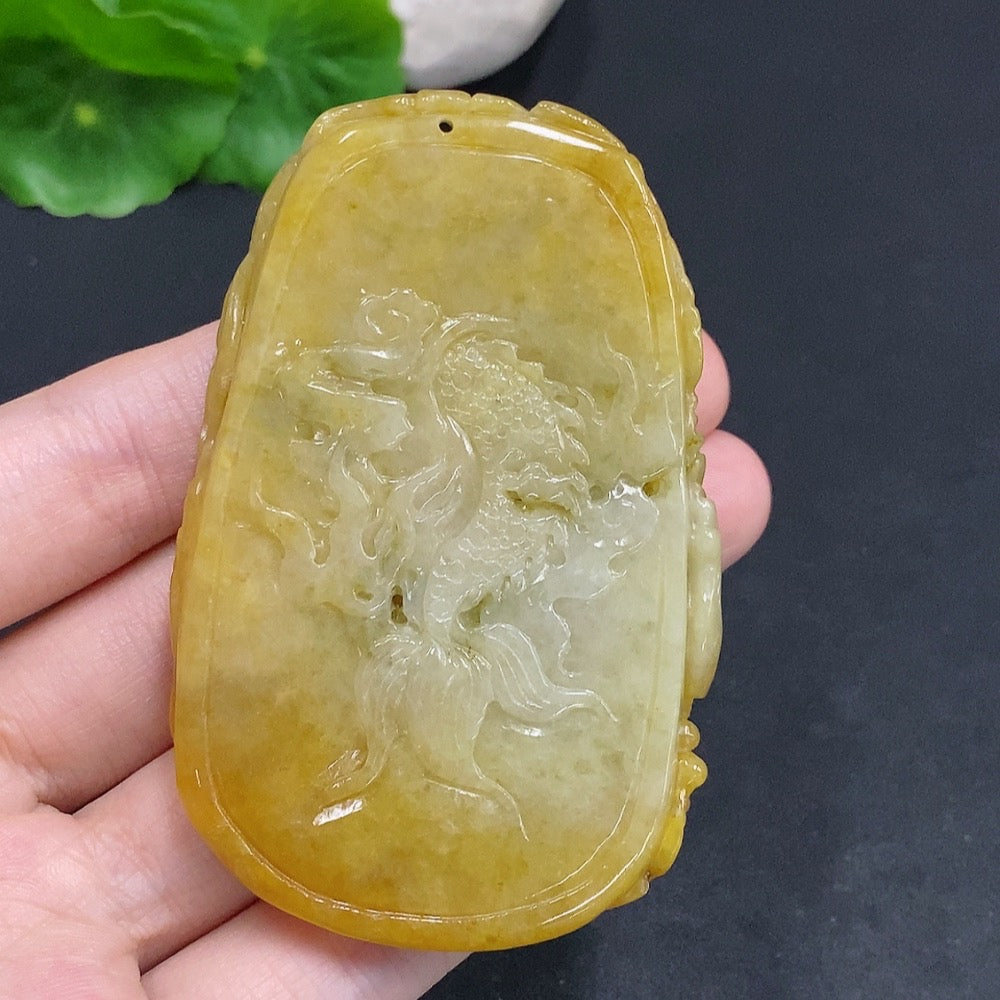 Jadeite Amitabha pendant from HUILIU HQ, featuring a carved jade Buddha figure on a smooth jade pendant.