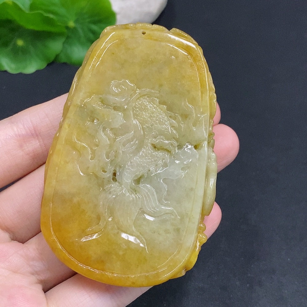 Jadeite Amitabha pendant from HUILIU HQ, featuring a smooth, polished green jade carved with Amitabha Buddha figure.