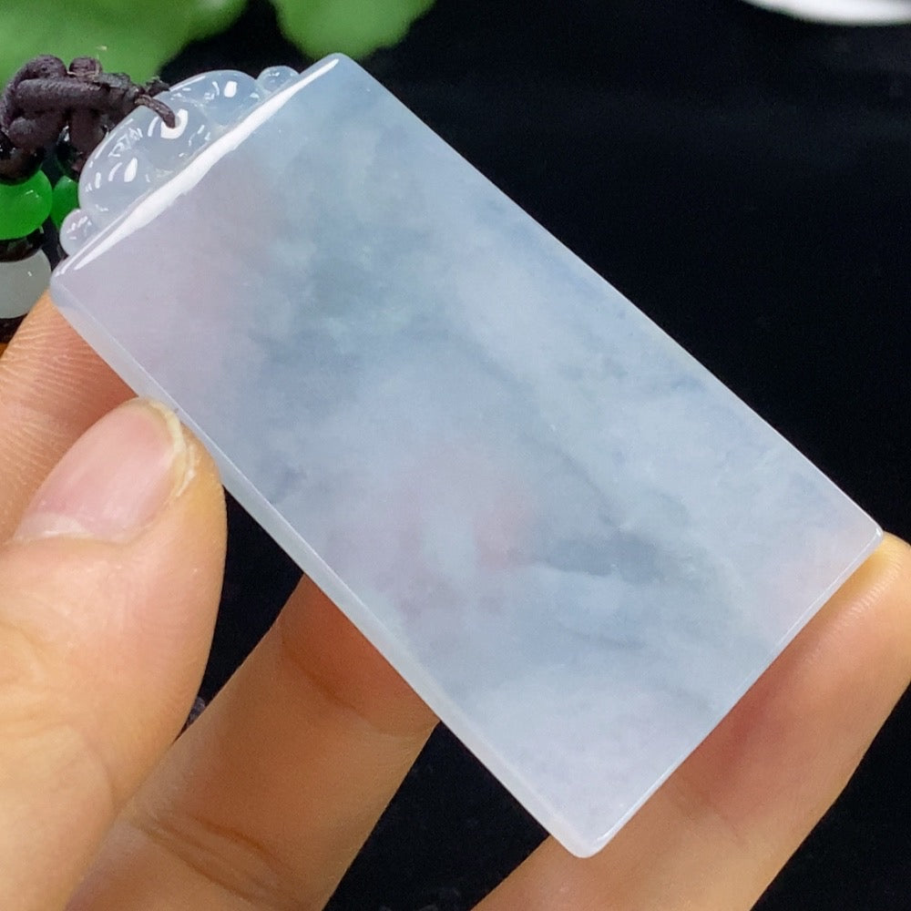 HUILIU HQ jadeite antique pendant featuring intricate carvings and natural green jade stone, close-up view of the pendant.