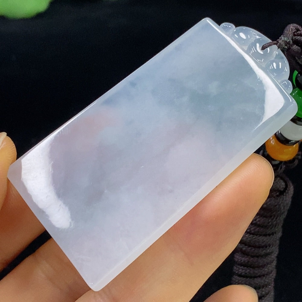 HUILIU HQ jadeite antique pendant featuring intricate carvings and a smooth polished surface, showcasing traditional craftsmanship.