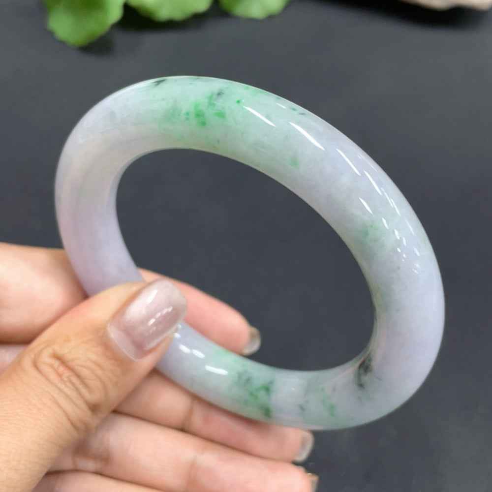 HUILIU HQ jadeite bangle, 57.5mm, smooth green jade bracelet with polished finish, showcasing natural jade texture.