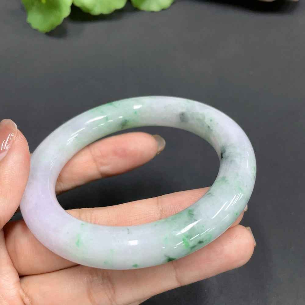 HUILIU HQ jadeite bangle, 57.5mm diameter, smooth green jade jewelry bracelet on a plain background