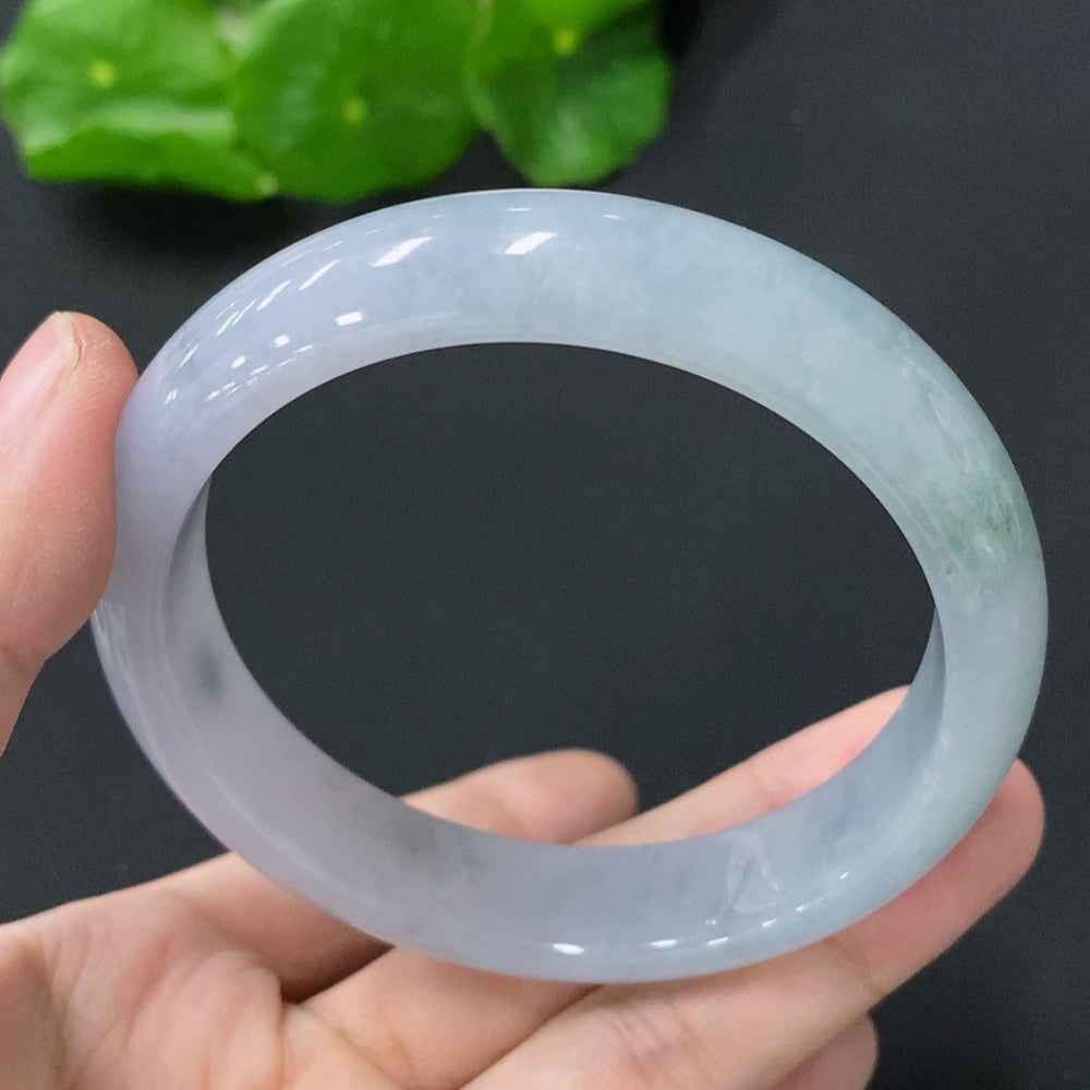 HUILIU HQ jadeite bangle, size 56.8mm, 53.321g, smooth green jade bracelet on a neutral background.