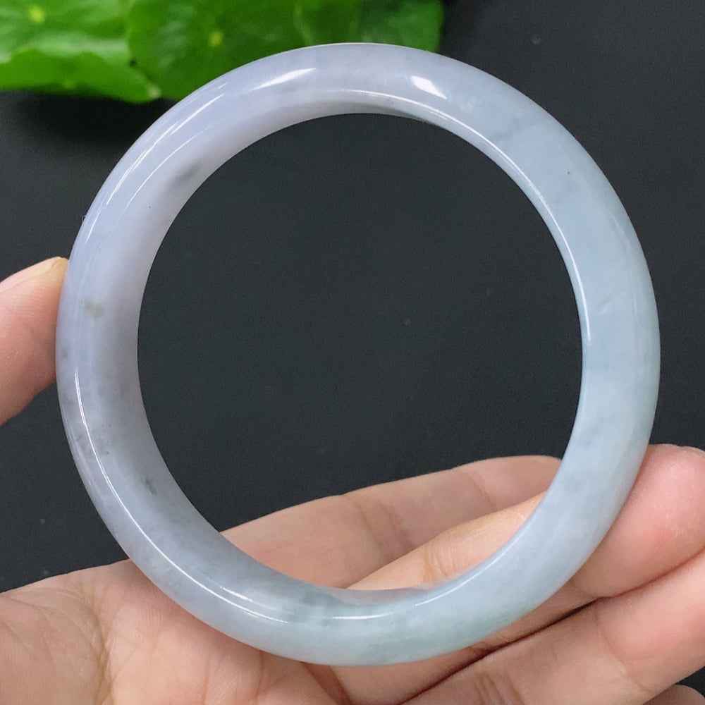 HUILIU HQ jadeite bangle, size 56.8mm, weighs 53.321g, smooth green jade bracelet on a neutral background.