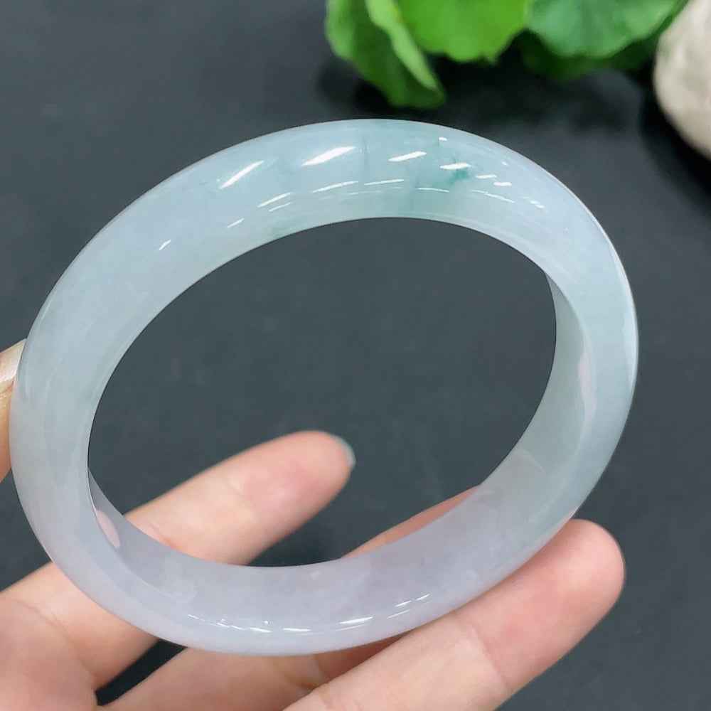 HUILIU HQ jadeite bangle in size 58.8mm, weighing 56.4g, featuring a smooth, polished jade surface and rounded shape.