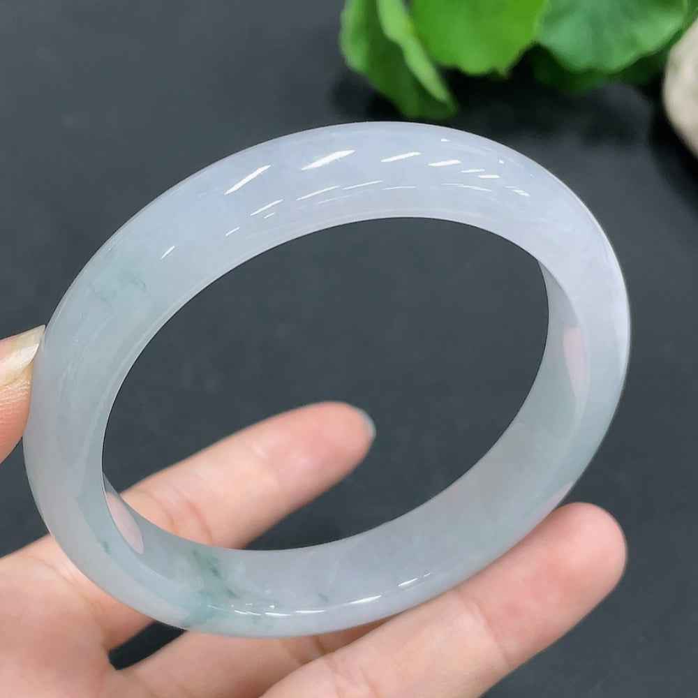 HUILIU HQ jadeite bangle, size 58.8mm, weighs 56.4g, smooth green jade bracelet on a neutral background.
