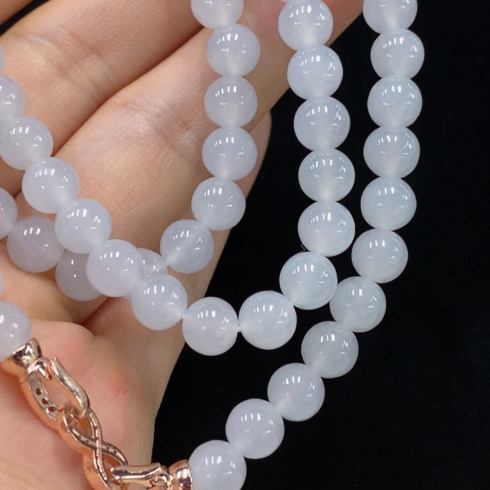 HUILIU HQ jadeite bead necklace with 6.6mm round beads, weighs about 58.75 grams, non-gold, natural green color.