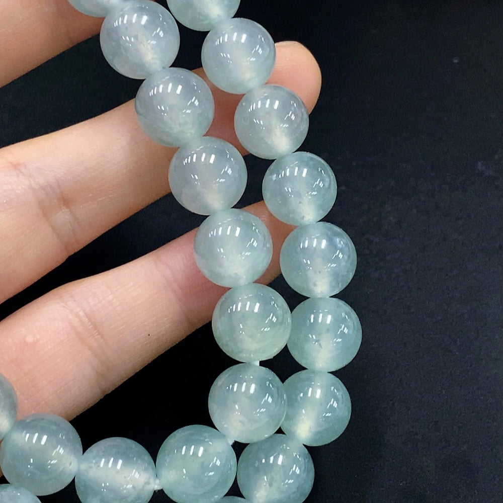 HUILIU HQ Jadeite beaded necklace with 10.3mm beads, showcasing smooth, polished jade beads with a natural green hue.