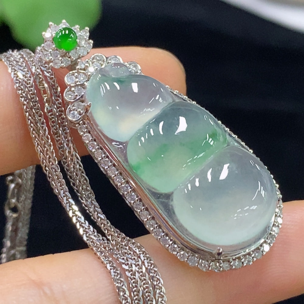 HUILIU HQ jadeite bean inlay piece with 18K gold and diamond accents, includes chain, weighs approximately 10.35g.