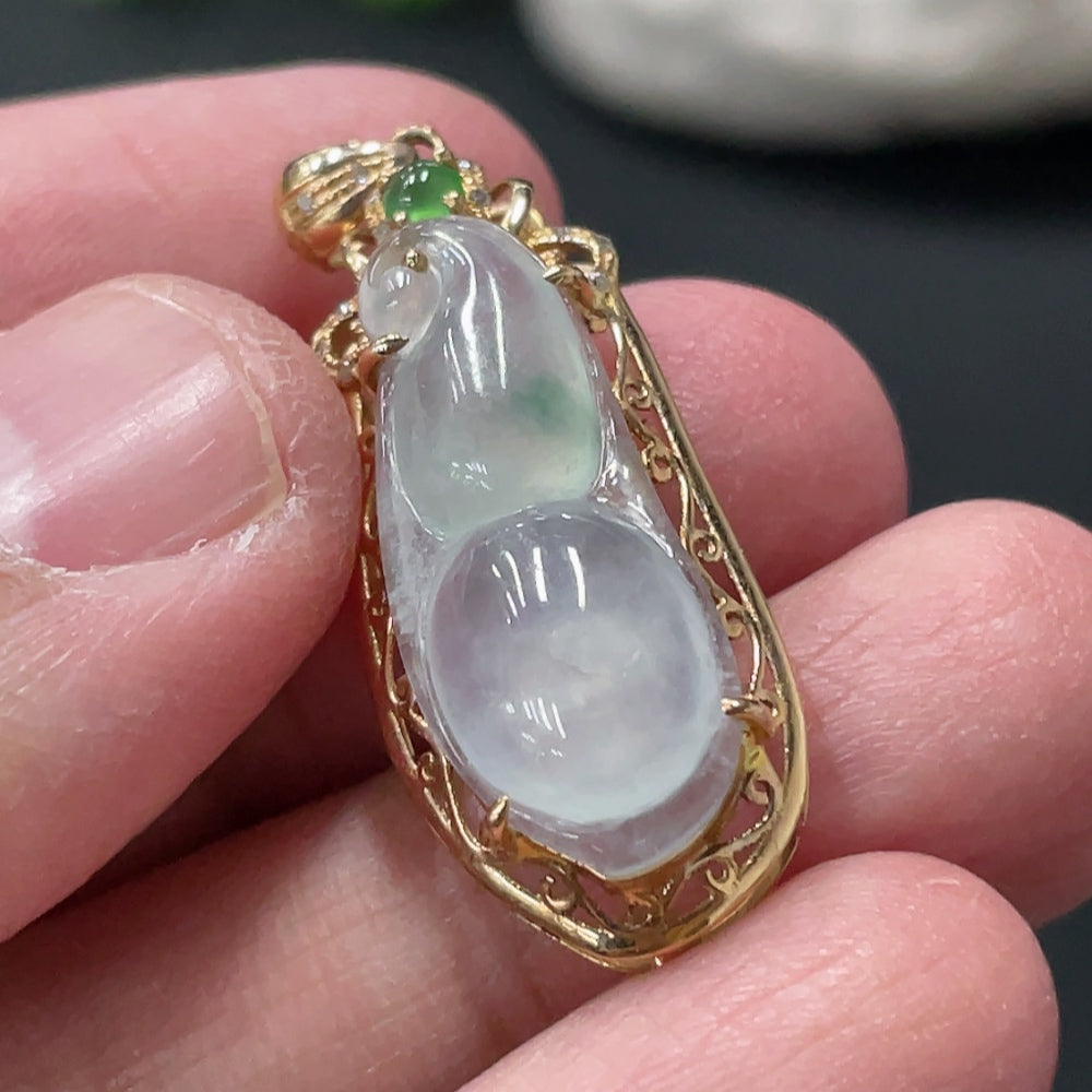 Jadeite blessed bean pendant by HUILIU HQ featuring 18K gold accents and diamond details, weighing approximately 2.46g.