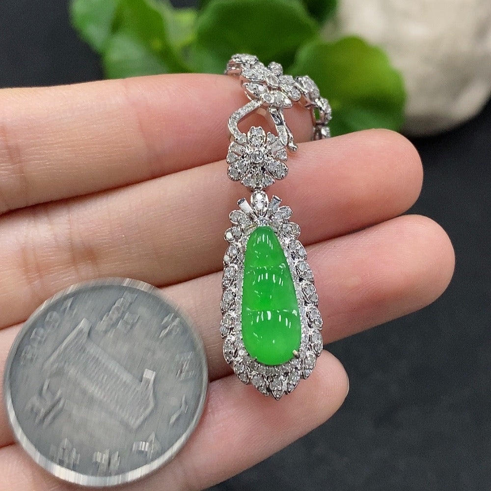 HUILIU HQ jadeite blessing bean necklace with 18K gold and diamond details, shown with chain, weighing approximately 15.87g.