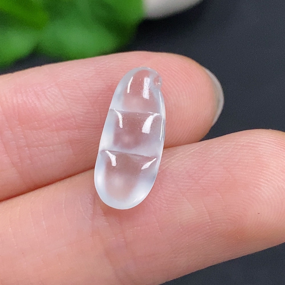 HUILIU HQ jadeite blessing bean pendant showcasing smooth, green jade with intricate carving and polished finish.