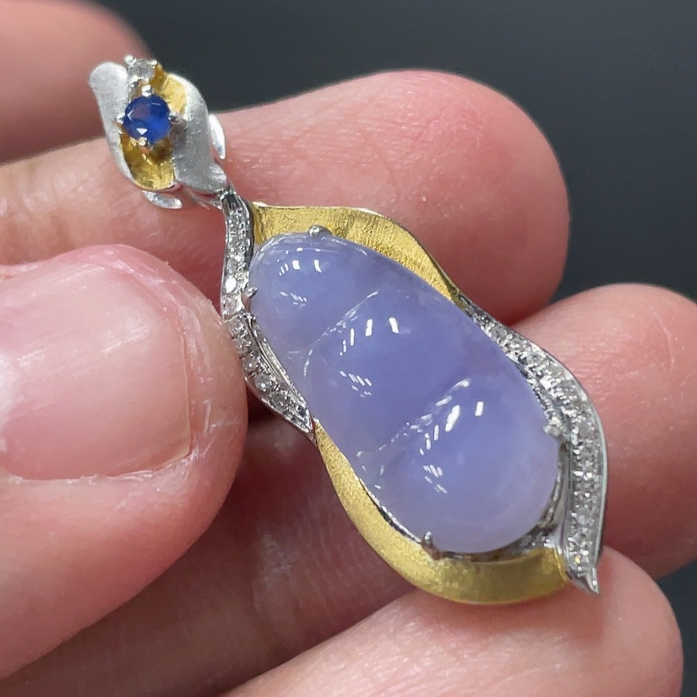 Jadeite Blessing Bean Pendant with 18K gold setting, diamond accents, and a smooth jade surface, created by HUILIU HQ.
