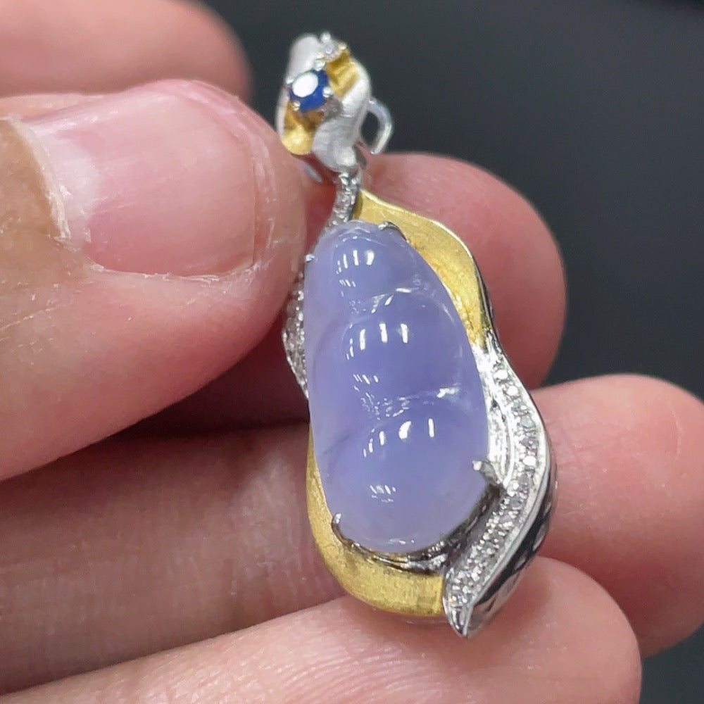 HUILIU HQ jadeite blessing bean pendant with 18K gold setting, diamond accents, featuring intricate design and smooth jade surface.