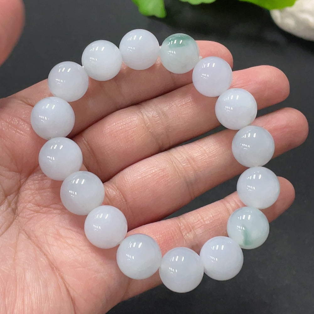 Huiliu certified jadeite bracelet with 12.4mm round jade beads, natural green color, elegant jewelry accessory.