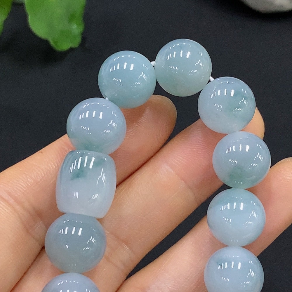 HUILIU HQ jadeite bracelet with 12.5mm beads, showcasing smooth, polished jade stones and a total weight of approximately 52.8g.