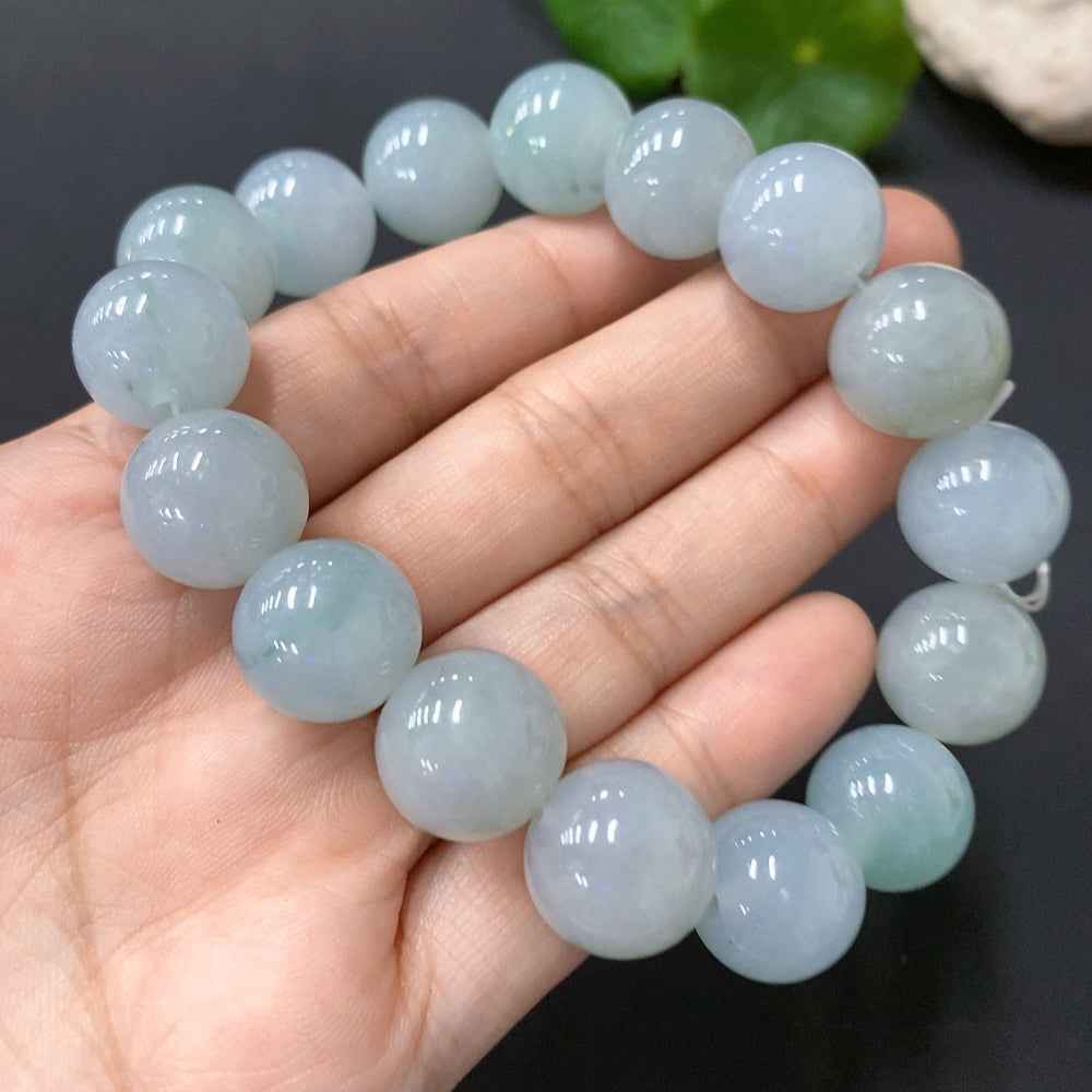 HUILIU HQ jadeite bracelet with 13.3mm beads, weighing approximately 66.24g, featuring smooth, polished jade stones.