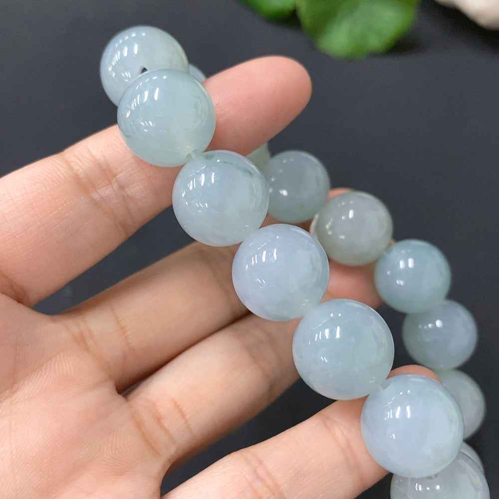 HUILIU HQ jadeite bracelet with 13.3mm beads, showcasing smooth jade stones and a polished finish.