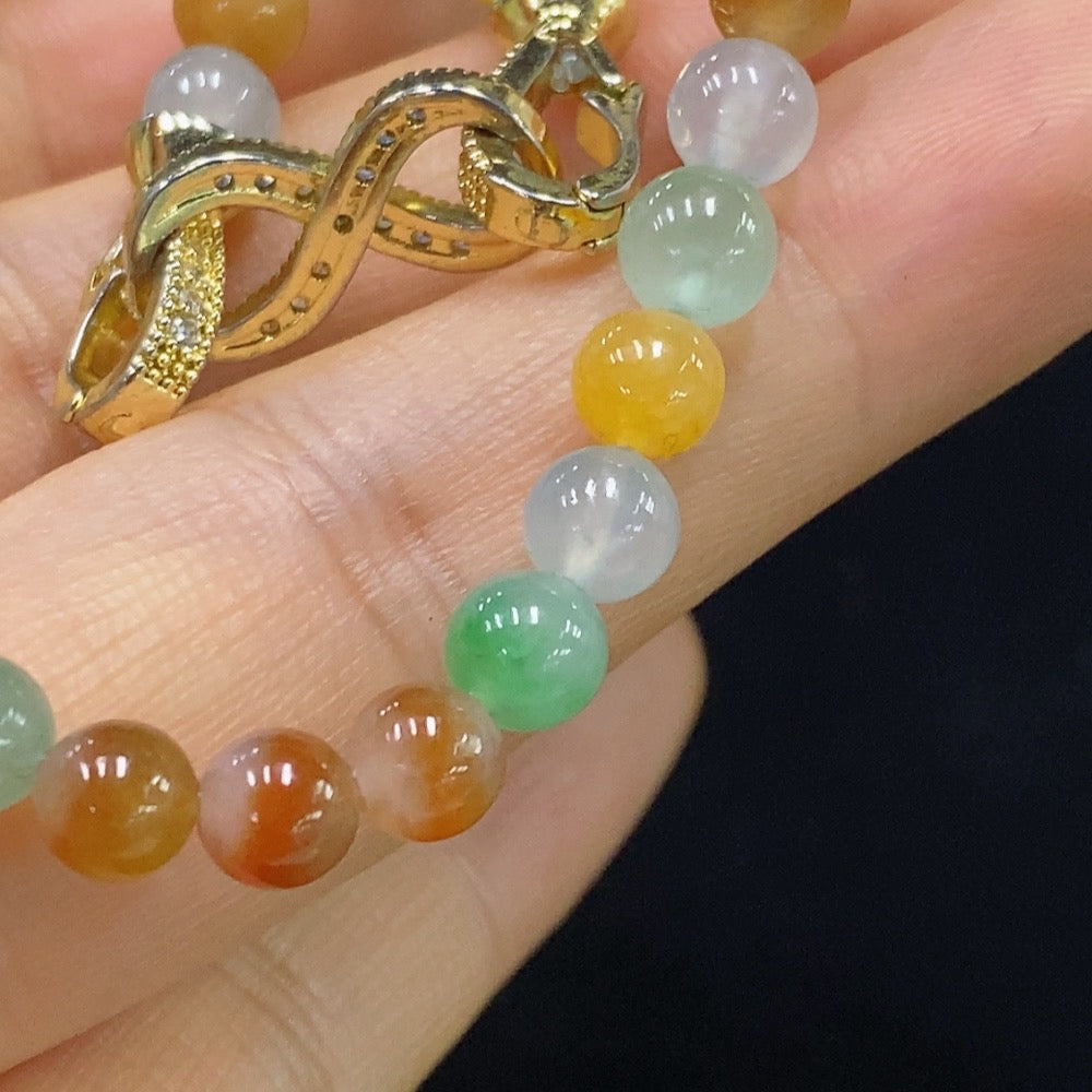 HUILIU HQ Jadeite bracelet, 5.2mm beads, non-gold, approx. 12.97g, showcasing smooth, polished jade jewelry.