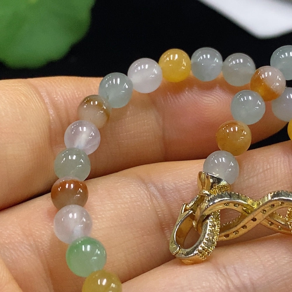 HUILIU HQ jadeite bracelet with 5.2mm beads, non-gold, weighing approximately 12.97 grams, showcasing smooth, polished jade beads.