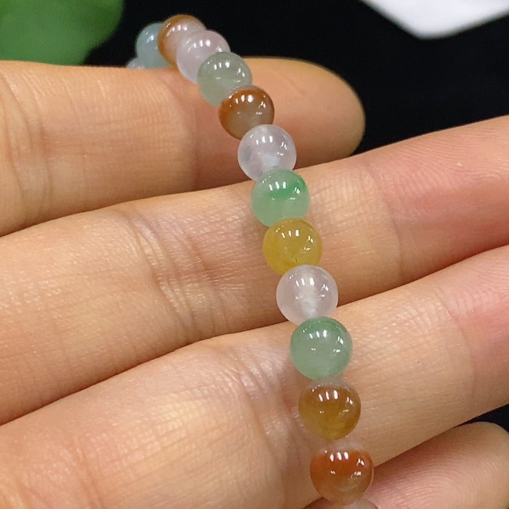 HUILIU HQ jadeite bracelet with 5.2mm beads, non-gold, totaling approximately 12.97g, showcasing smooth, polished jade stones.
