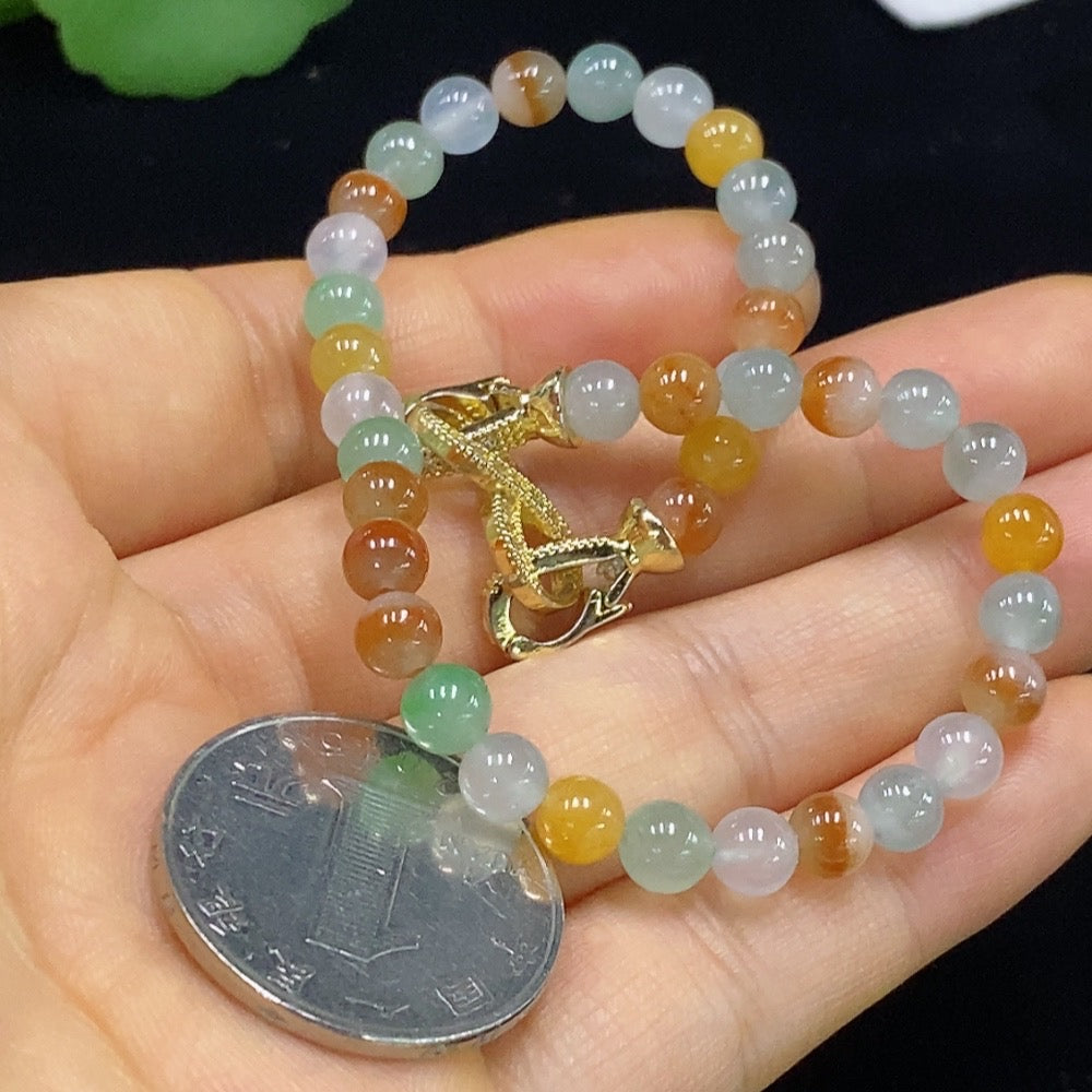 HUILIU HQ jadeite bracelet with 5.2mm beads, non-gold, weighing approximately 12.97g, showcasing smooth, polished jade stones.
