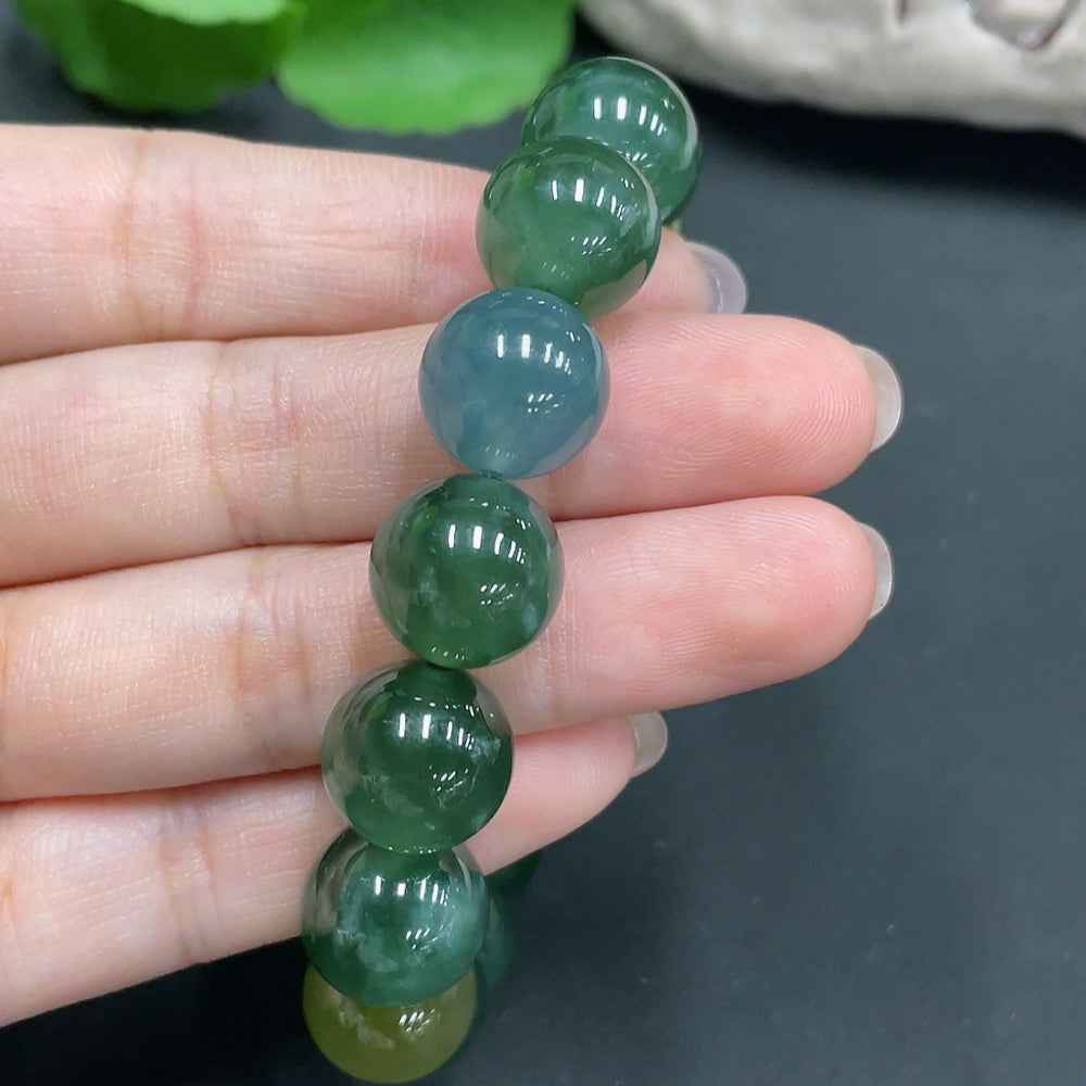 HUILIU HQ jadeite bracelet with 12.8mm diameter beads and 57.283g weight, featuring smooth, polished jade gemstones.
