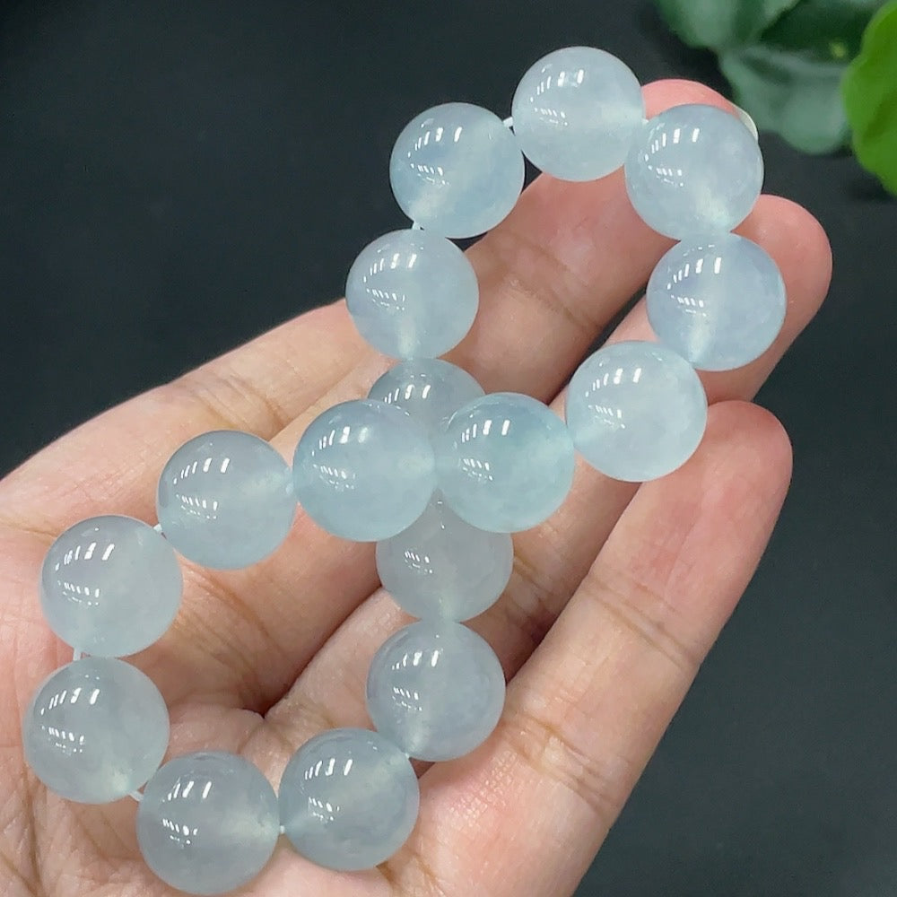 HUILIU HQ jadeite bracelet with 12.3mm beads, weighing approx. 50.6g, showcasing smooth, polished green jade stones.