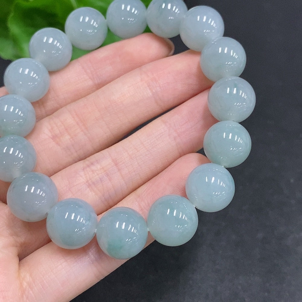 HUILIU HQ jadeite bracelet weighing 52.1g with 12.3mm size, featuring smooth, polished jade stones on a natural jewelry design.