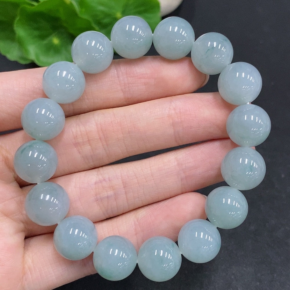 HUILIU HQ Jadeite bracelet with 52.1g weight and 12.3mm size, showcasing smooth, polished jadeite beads.