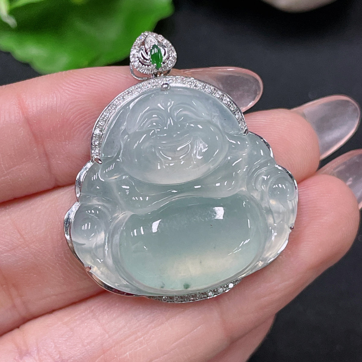 Jadeite Buddha inlay piece by HUILIU HQ featuring 18k gold and diamond accents, weighing approximately 8.48 grams.