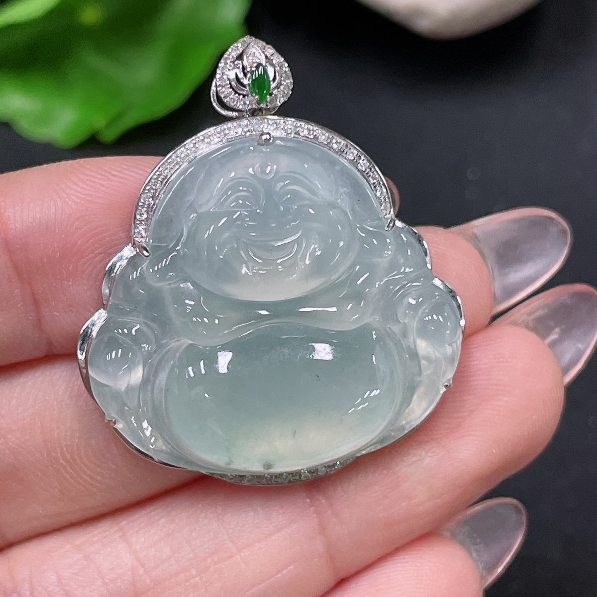 Jadeite Buddha inlay piece by HUILIU HQ, 18k gold with diamond accents, weighing approximately 8.48g, detailed jade craftsmanship.