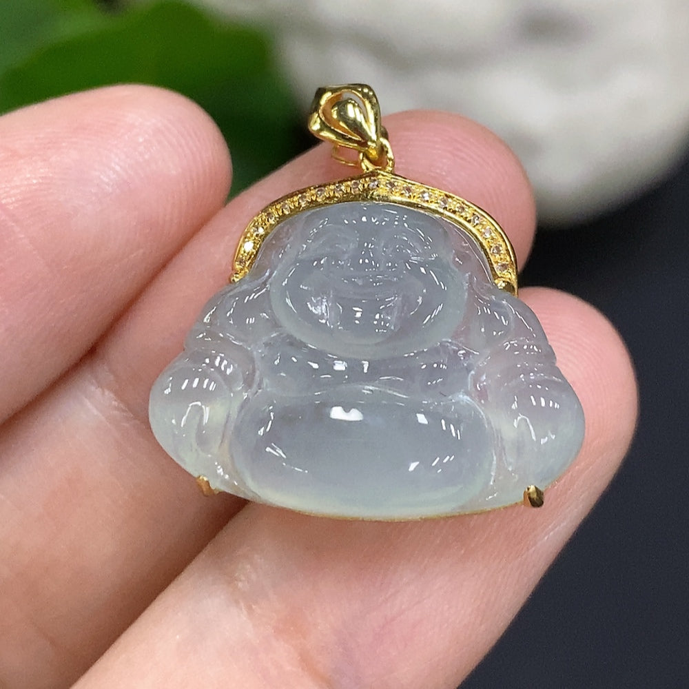 Jadeite Buddha pendant set in 18K gold with diamond accents, featuring a jade Buddha figure and matching jewelry.