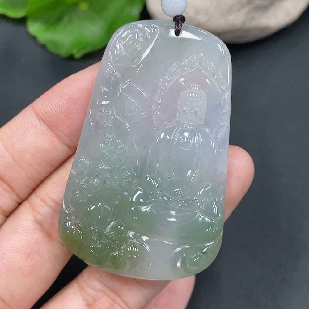Jadeite Buddha pendant from HUILIU HQ, detailed carved jade Buddha figure, weighing 28.657g, showcasing smooth green jade surface.