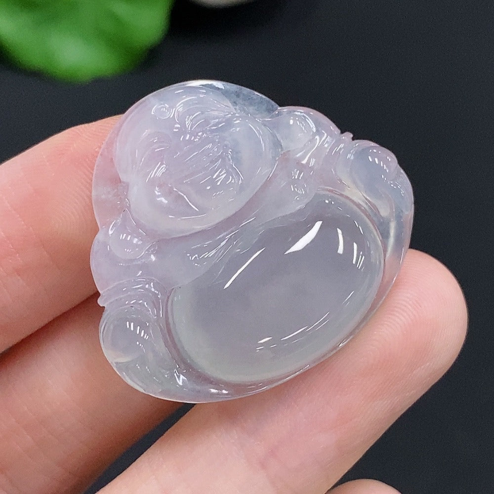 Jadeite Buddha pendant from HUILIU HQ, carved in green jade, weighing approximately 7.3 grams, with detailed Buddha figure.