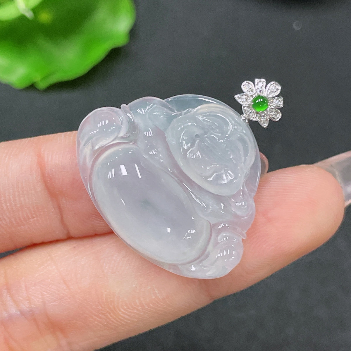 Jadeite Buddha pendant with 18K gold and diamond accents, crafted by HUILIU HQ, weighing approximately 6.23 grams.