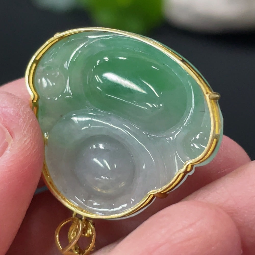 Huiliu Certified jadeite Buddha pendant with diamond accents, showcasing intricate carving and polished jade surface.