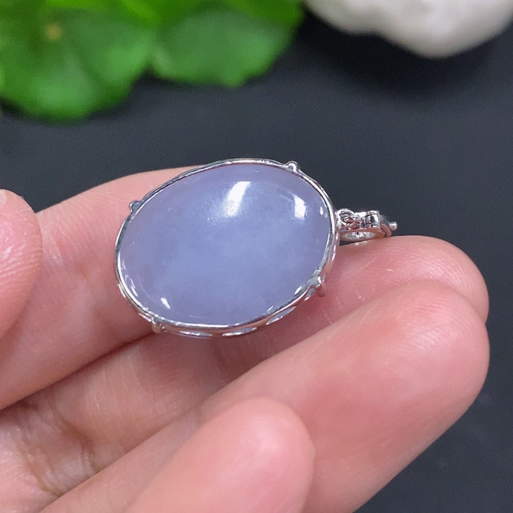 HUILIU HQ jadeite cabochon pendant with 18k gold setting and diamond accents, showcasing the smooth, green jade gemstone.