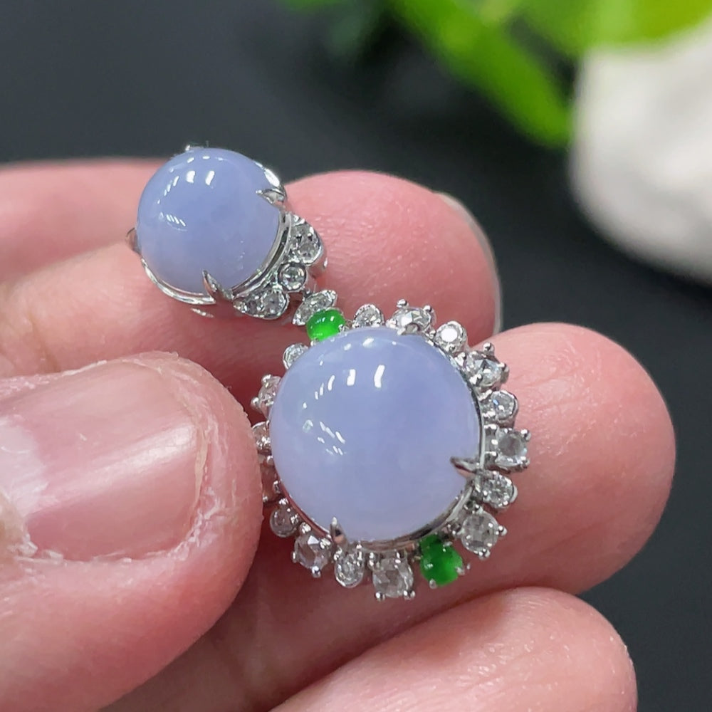 Jadeite cabochon pendant with 18K gold and diamond accents, showcasing a smooth green jade stone and intricate detailing.