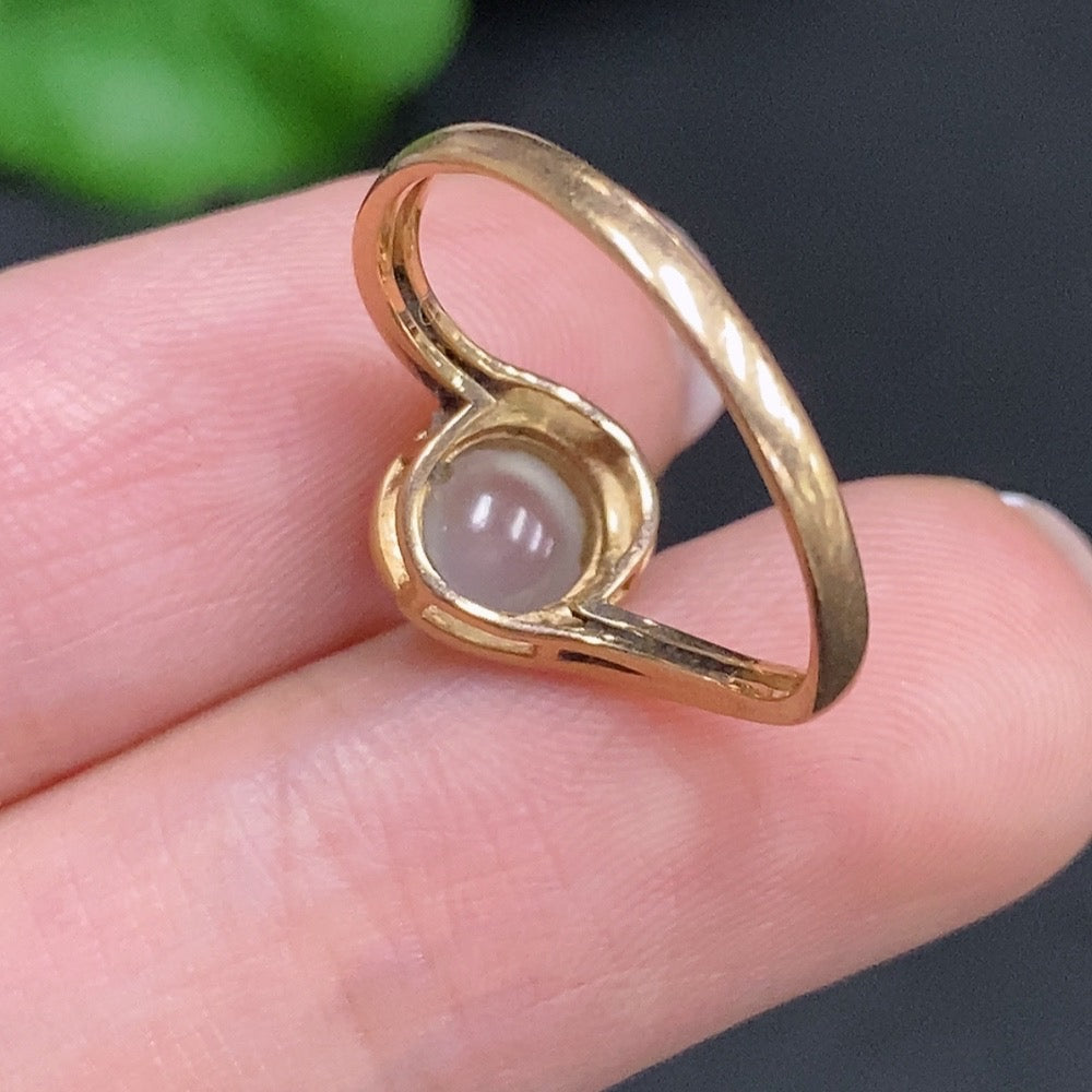 Jadeite cabochon ring with diamond accents in 18k gold, size 13, from HUILIU HQ, featuring a smooth jade gemstone and gold band.