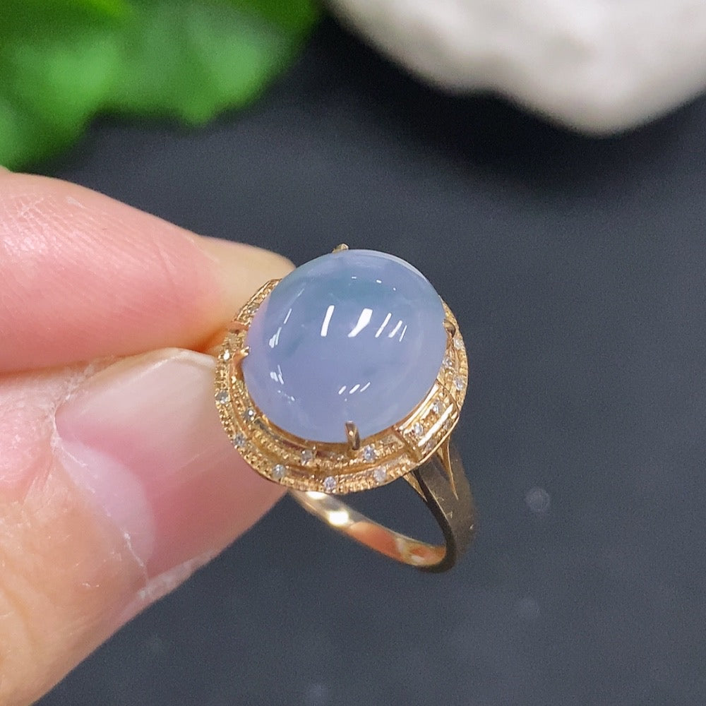 Huiliu Certified Jadeite Cabochon Ring with diamond accents, featuring a smooth green jade gemstone and elegant silver band.