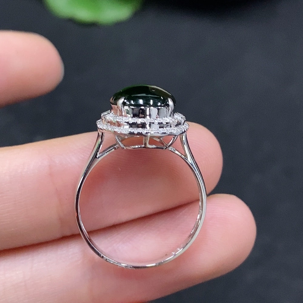 HUILIU HQ jadeite cabochon ring with diamond accents, showcasing smooth green jade and sparkling diamond details.