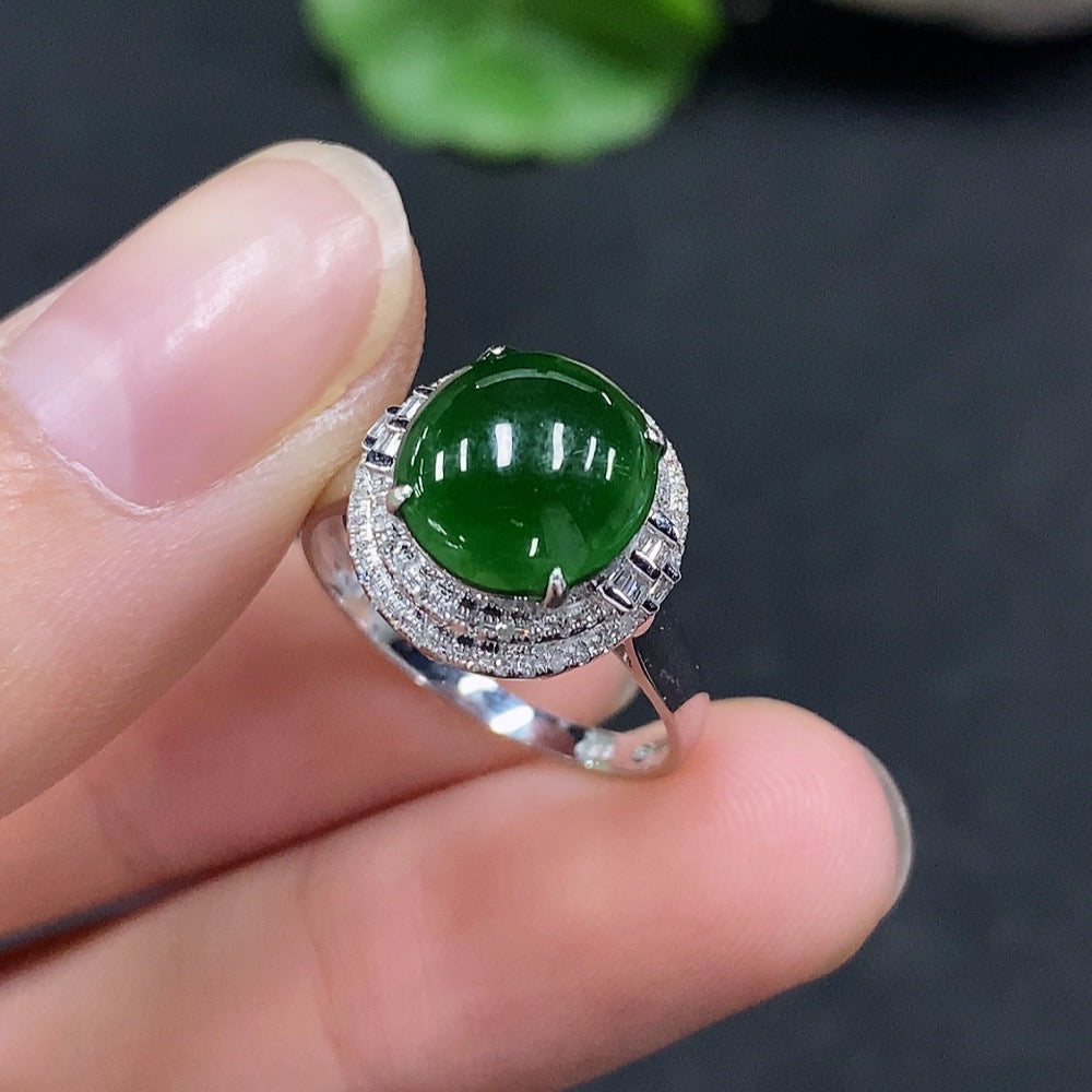 Huiliu Certified jadeite cabochon ring with diamond accents, elegant jewelry piece featuring smooth green jade and sparkling stones.