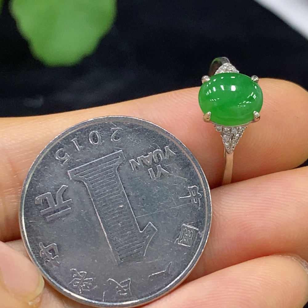HUILIU HQ Jadeite cabochon ring with 18K gold band, diamond accents, size 14, showcasing a smooth green jade gemstone.