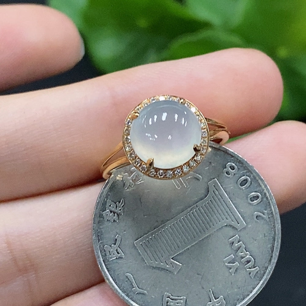 Huiliu Certified Jadeite Cabochon Solitaire Ring with Diamond Accents, showcasing elegant green jade and sparkling diamonds.