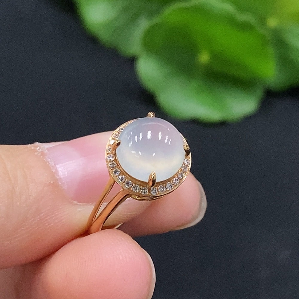 Huiliu HQ jadeite cabochon solitaire ring with diamond accents, featuring a polished green jade gemstone and elegant setting.