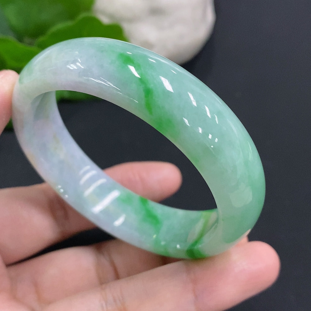 Broken Jadeite Concubine Bracelet by HUILIU HQ, size 58/50.7, approx. 49.1g, showing damage and cracks in the jade bracelet.