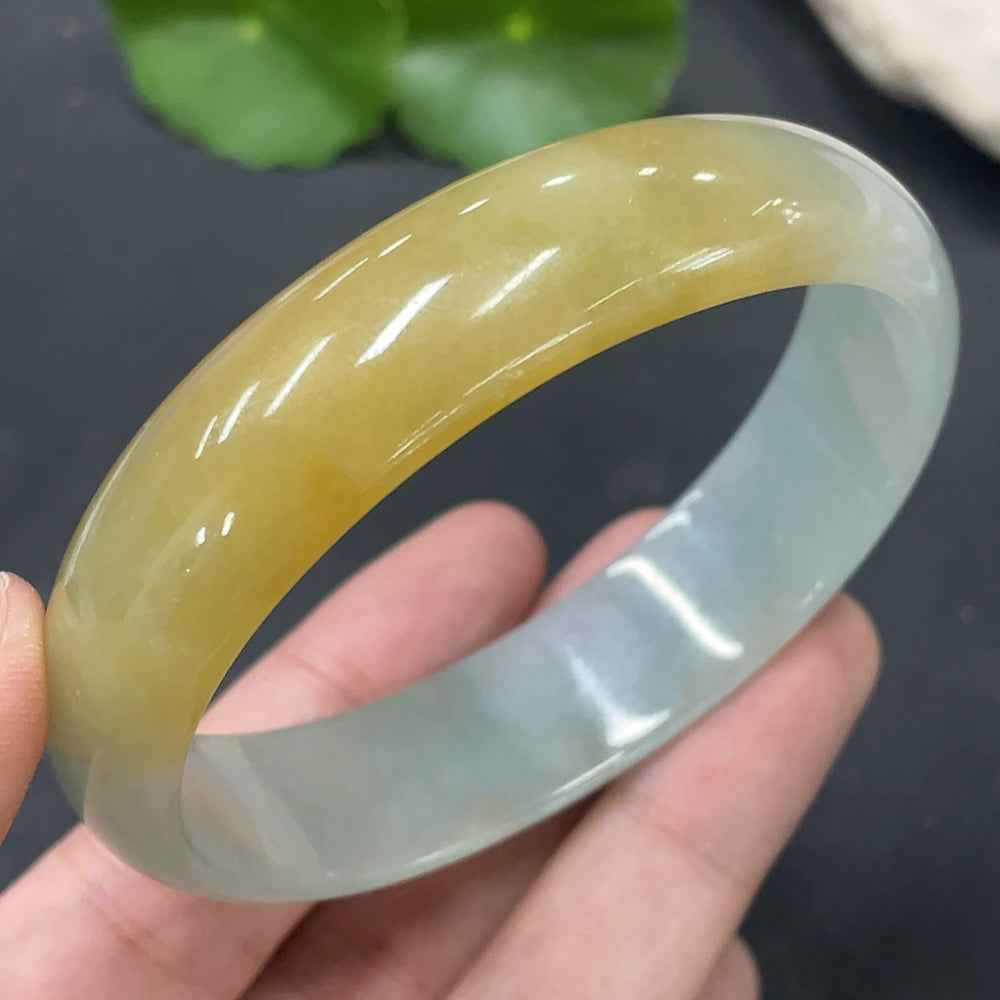 HUILIU HQ jadeite concubine bracelet with size 58.8/51mm, undetermined color, weighing 42.219g, featuring smooth jadeite beads.