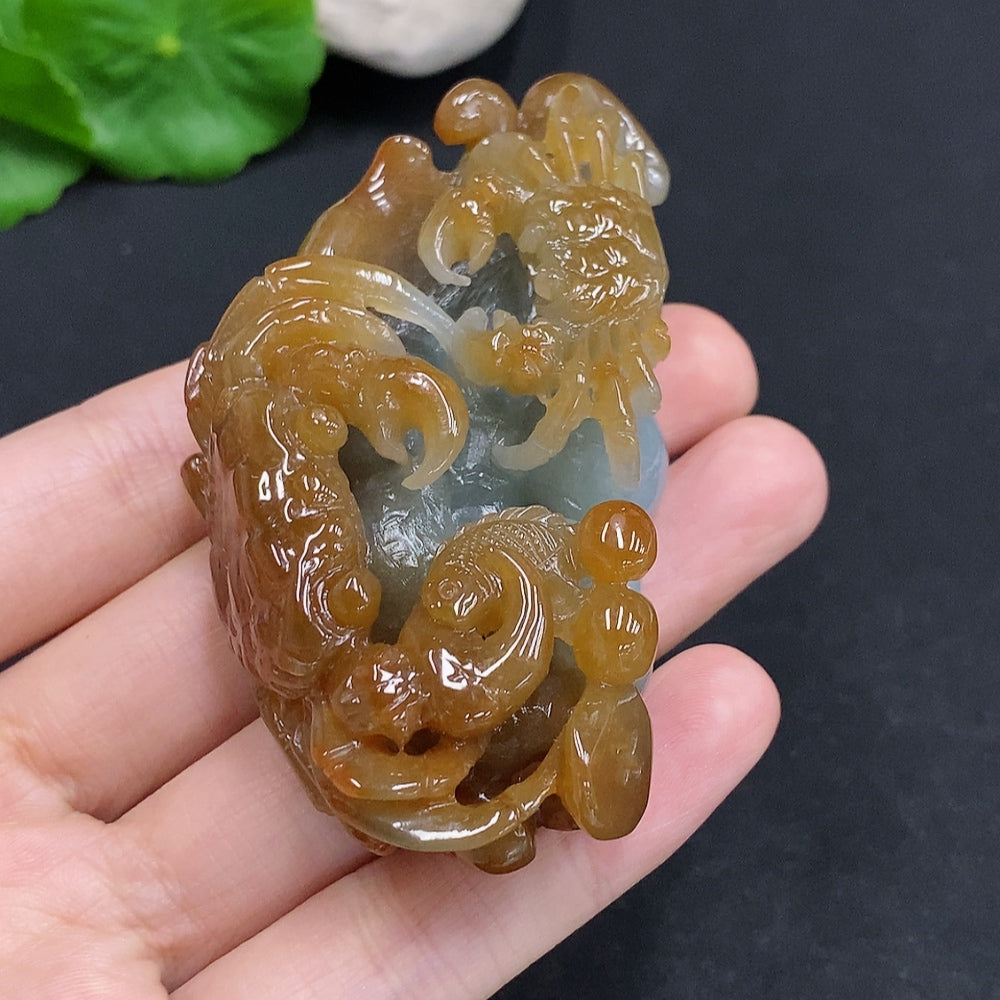 Jadeite crab pendant from HUILIU HQ, approximately 75g, featuring a detailed jade crab design with undetermined color origin.